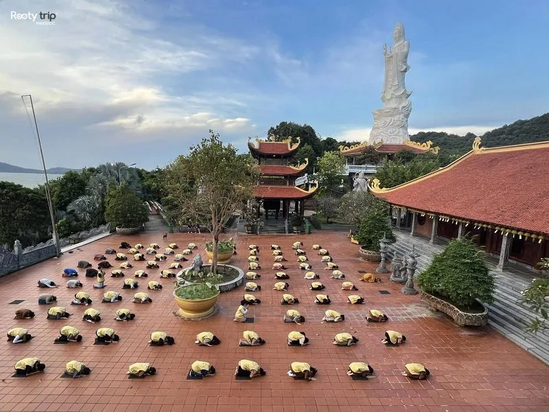 Ancient stone steps leading to a tranquil pagoda on Phu Quoc Island, surrounded by lush tropical greenery