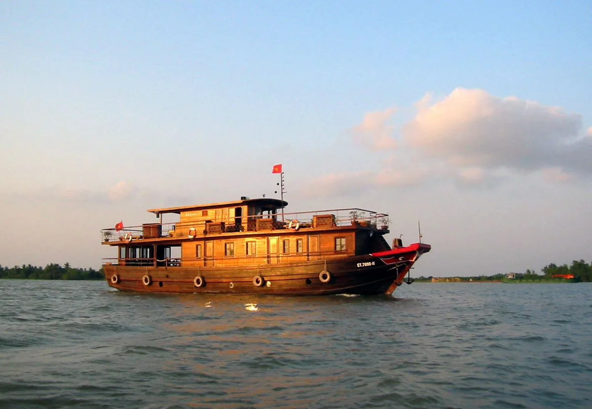 Cruise boat on the Bassac River in the Mekong Delta
