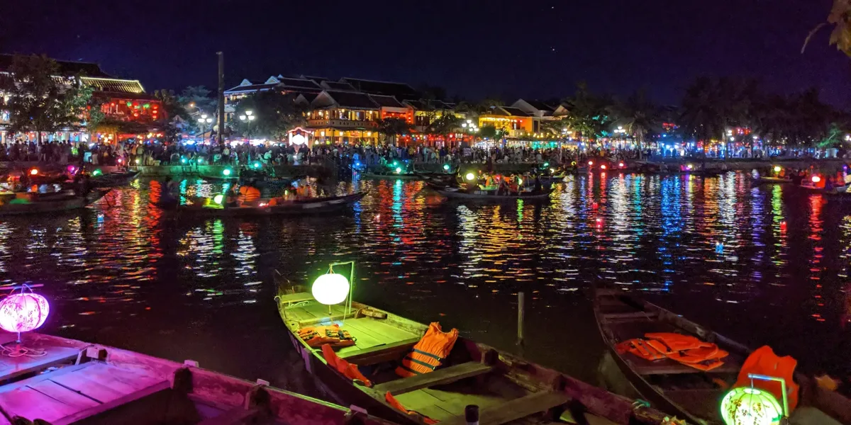 Lantern-lit narrow street in Hoi An's ancient town at night