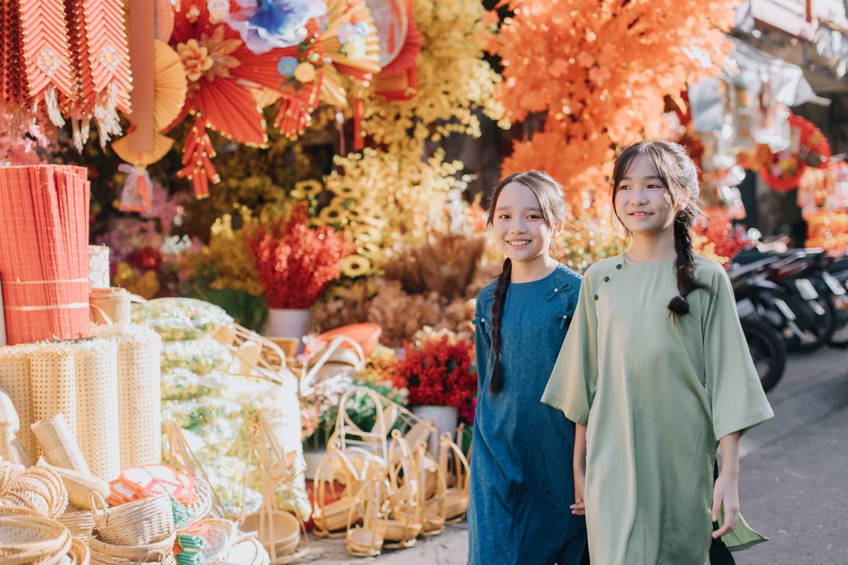 Street in Vietnam decorated with red and yellow Tet banners and lanterns