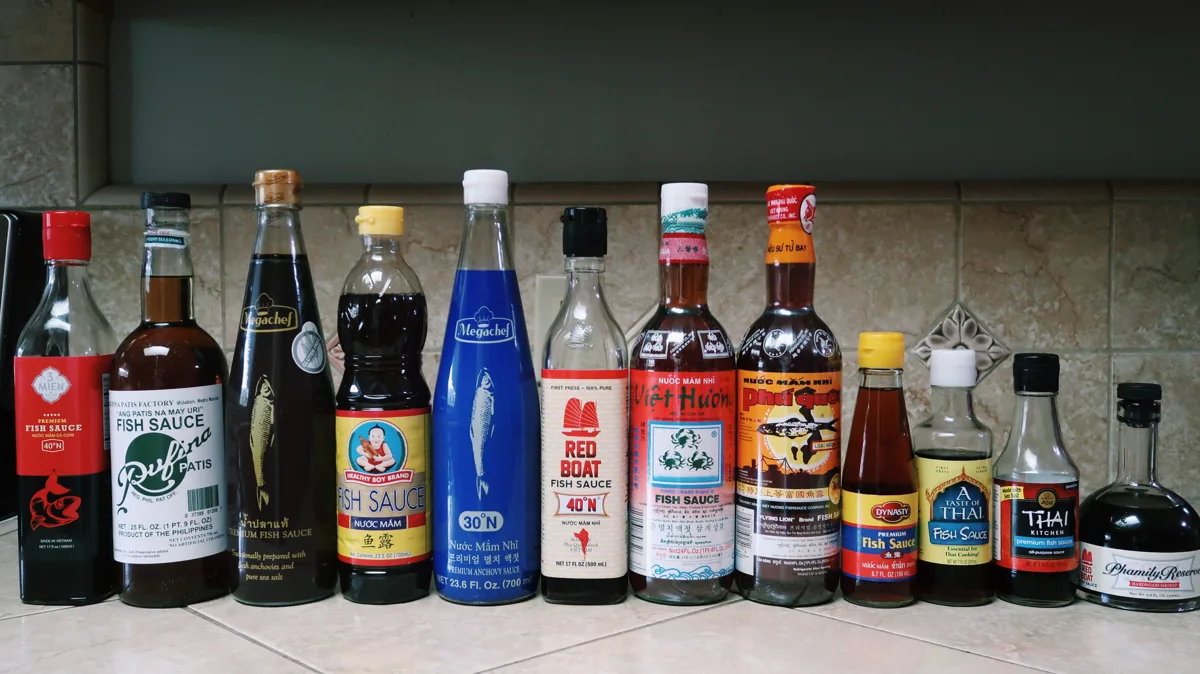Bottles of fish sauce commonly used in Burmese kitchens