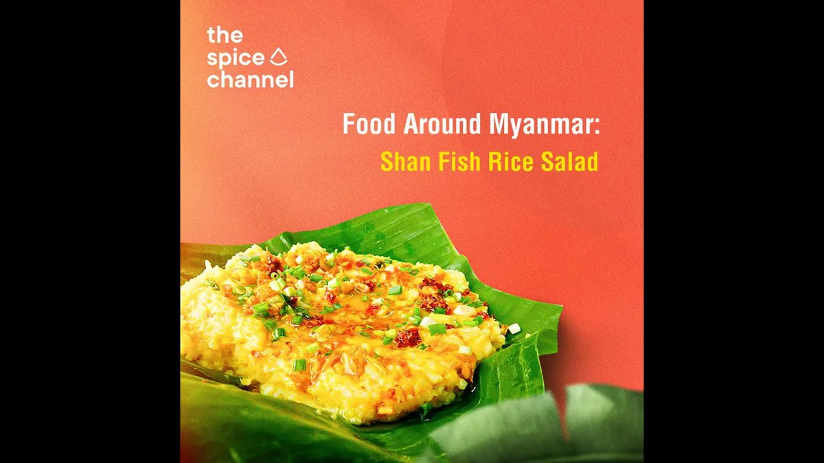 Turmeric rice topped with flaked fish and garlic oil