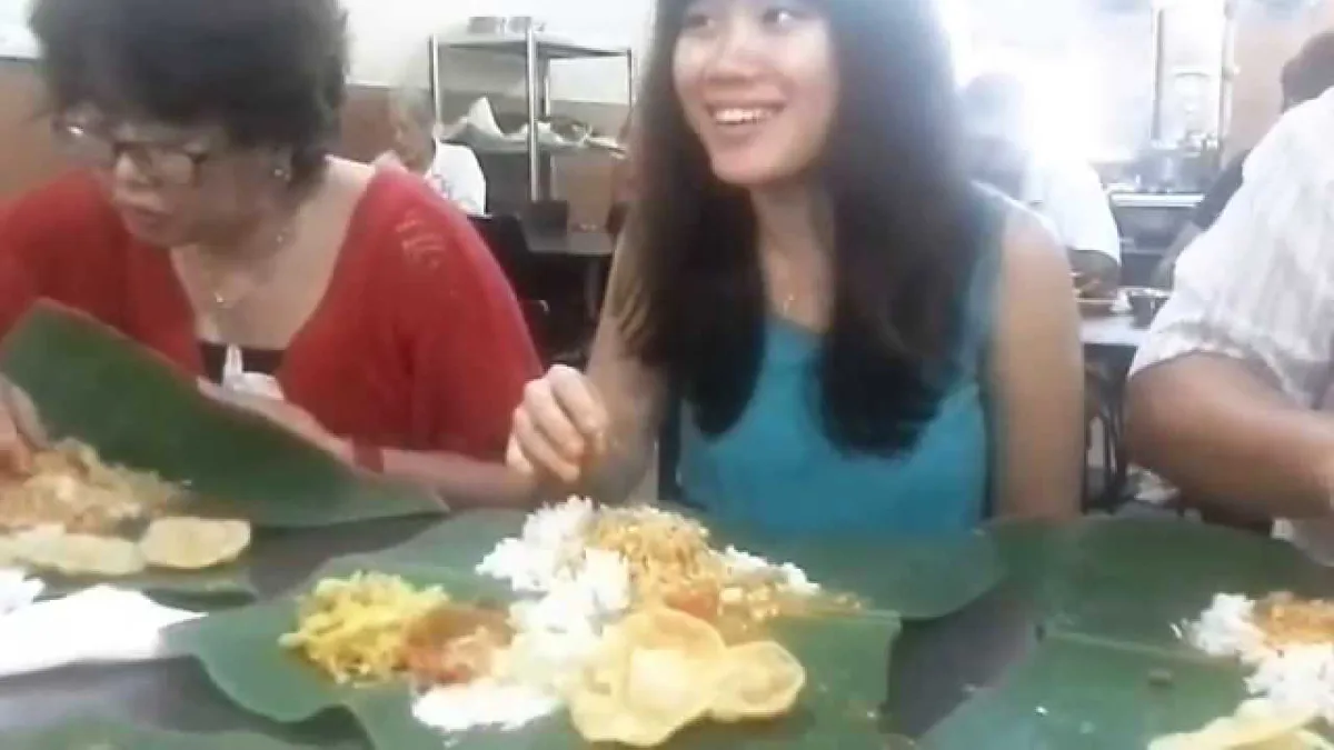 Hand forming rice into a ball to eat in Burmese dining custom