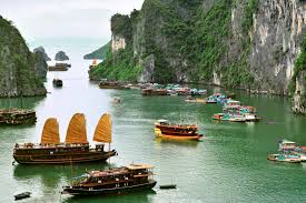 Ha Long Bay cruise boats among limestone islands