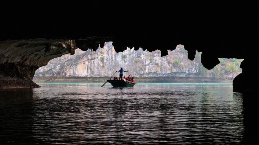 Bamboo Boat At Dark & Bright Caves