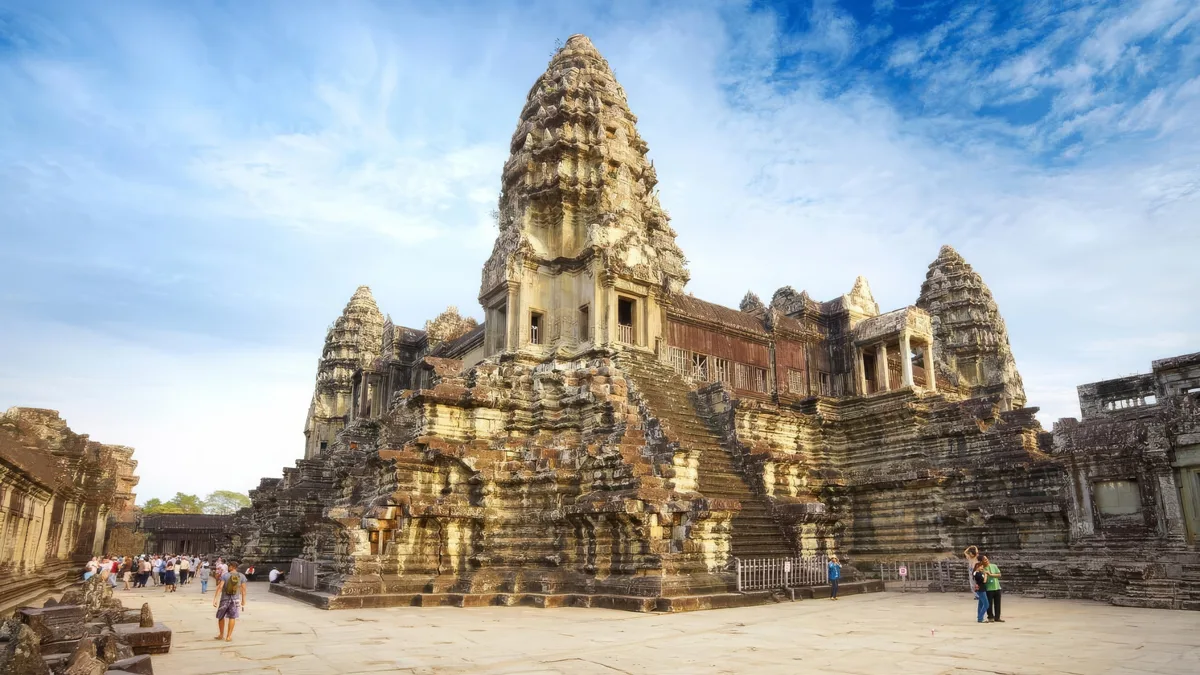 Panoramic view of Angkor Wat, limestone karsts of Halong Bay, and Bangkok's temples