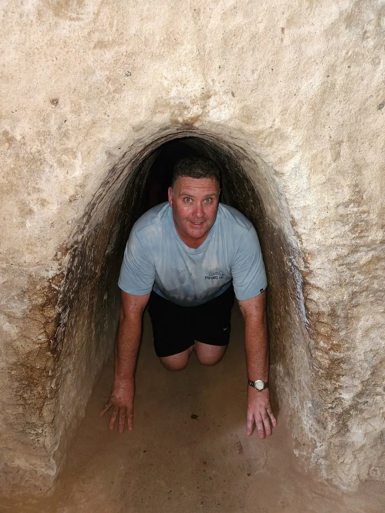 Entrance to Cu Chi Tunnels with lush foliage